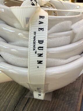 Rae Dunn White Stacked Ceramic measuring cups with Branded Ribbon